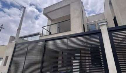 Casa com 3 dormitórios à venda, 148 m² por R$ 1.200.000,00 - Boqueirão - Praia Grande/SP