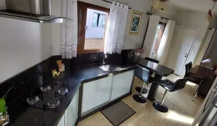 CASA COM 3 DORMITÓRIOS SENDO 1 SUÍTE E AMPLO ESPAÇO DE TERRENO