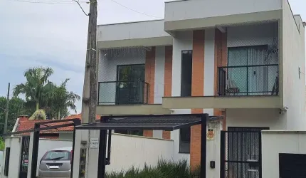 CASA SOBRADO NO BAIRRO SANTA TEREZINHA COM 72,50m², DUAS SUÍTES, DUAS VAGAS DE GARAGEM E ESPAÇO NOS FUNDOS