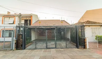 Casa com 4 quartos à venda na Rua Veríssimo Rosa, 240, Partenon, Porto Alegre por R$ 1.300.000