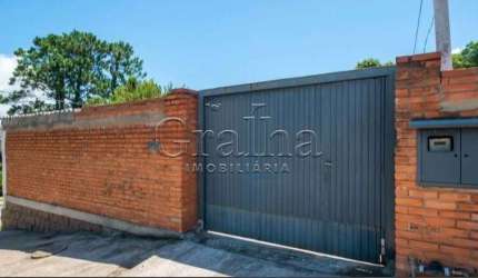 Casa com 3 quartos à venda na Rua Oswaldo Olmiro Machado, 8, Ipanema, Porto Alegre por R$ 325.000