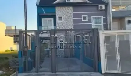 Casa em condomínio fechado com 4 quartos à venda na Rua Silvino Nedel, 100, Mário Quintana, Porto Alegre por R$ 640.000