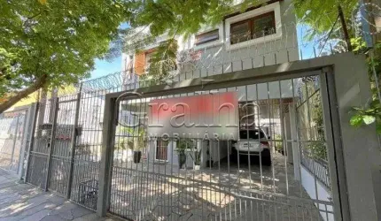 Casa com 4 quartos à venda na Rua Coronel Jaime da Costa Pereira, 376, Partenon, Porto Alegre por R$ 980.000