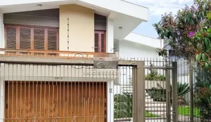 Casa com 3 quartos à venda na Travessa Bermudas, 67, Jardim Lindóia, Porto Alegre por R$ 1.380.000
