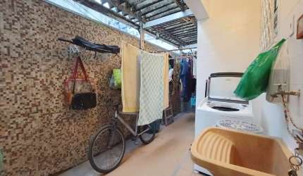 Apartamento Térreo à Venda em Santos-SP, Boqueirão: 2 quartos, 1 sala, 1 banheiro e 1 vaga de garagem. 62m² de conforto!
