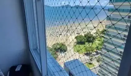 Apartamento à venda no Embaré, Santos-SP: 2 quartos, 2 salas, 2 banheiros, 1 vaga de garagem, 64m² - Vista Mar, Frente Mar