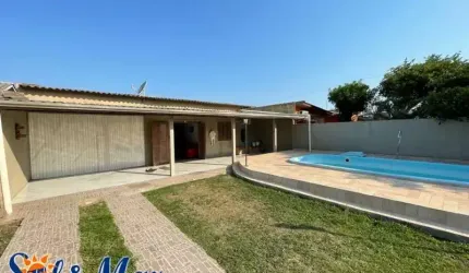 C606 Casa com piscina, na praia Presidente/Imbé