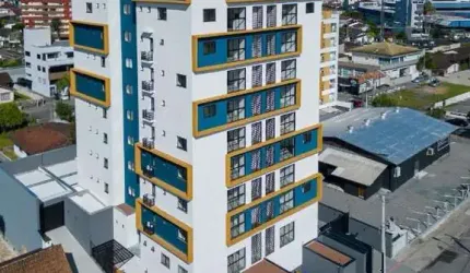 Apartamento à venda em Joinville-SC, Anita Garibaldi: 2 quartos, 1 suíte, 3 salas e 104,80 m² de área!