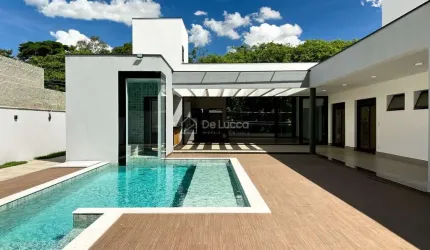 Casa em condomínio fechado com 4 quartos para alugar na Avenida Araçá, 137, Loteamento Alphaville Campinas, Campinas, 507 m2 por R$ 32.000