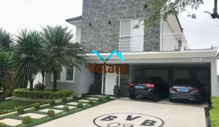 Casa de alto padrão em condomínio Alphaville, Santana de Parnaíba-SP! 4 suítes, 4 vagas de garagem, 325m² de área. Venha conferir!