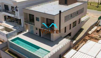Casa de alto padrão em condomínio Alphaville: 3 quartos, 3 suítes, 3 salas, 6 banheiros, 6 vagas de garagem, 501,98 m². Venda em Santana de Parnaíba-SP.