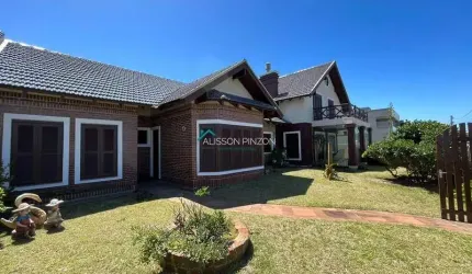 Residência de alto padrão com vista para praia e 04 terrenos.
