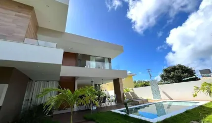 Luxuosa casa em condomínio à venda em Guarajuba, Camaçari-BA: 5 quartos, 5 suítes, 1 sala, 6 banheiros, 4 vagas de garagem, 250m².