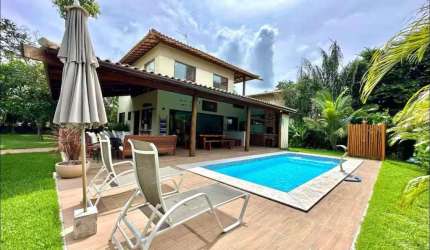 Casa de luxo em condomínio na Praia do Forte, Mata de São João-BA: 5 quartos, 4 suítes, 261m² de conforto e sofisticação!