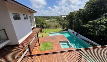 Casa de luxo à venda em condomínio na Praia do Forte, Mata de São João-BA: 5 quartos, 5 suítes, 6 banheiros, 4 vagas, 800m².