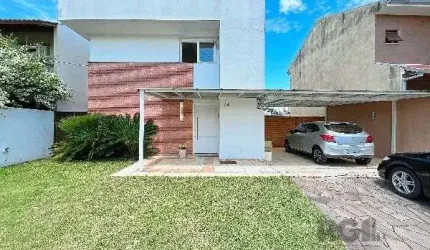 Casa em Porto Alegre, no bairro Hípica, com 3 dormitório(s), e 3 banheiros, à venda.