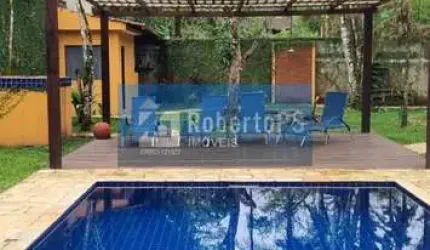 Espetacular Casa à Venda em Camburi, São Sebastião-SP: 4 quartos, 4 suítes, sauna, piscina e mais! Venha conhecer!
