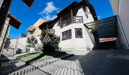 Casa com 3 quartos à venda na Rua Suécia, 209, Moinhos De Vento, Canoas por R$ 1.224.990
