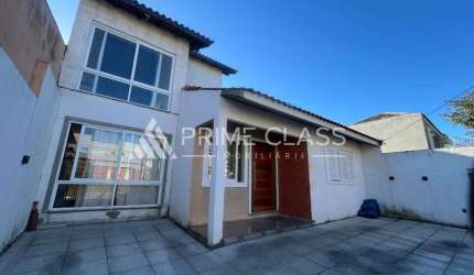 Casa com 3 quartos à venda na Rua Orion, 76, Estância Velha, Canoas por R$ 670.000