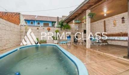 Casa com 4 quartos à venda na Rua das Andorinhas, 173, Igara, Canoas por R$ 636.000