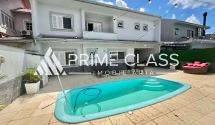 Casa com 5 quartos à venda na Rua Gardênia, 89, Loteamento Bela Vista, Canoas por R$ 1.450.000