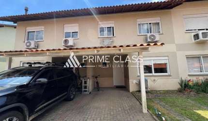 Casa em condomínio fechado com 3 quartos à venda na Rua Doutor Tancredo Neves, 160, Fátima, Canoas por R$ 480.000