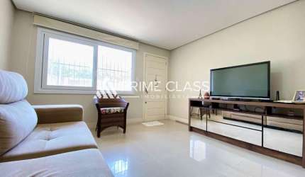 Casa com 2 quartos à venda na Rua Irani Bertelli, 199, Nossa Senhora das Graças, Canoas por R$ 479.000