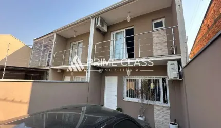 Casa com 2 quartos à venda na Rua Irani Bertelli, 197, Nossa Senhora das Graças, Canoas por R$ 470.000