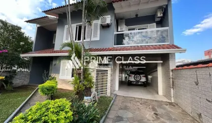 Casa com 4 quartos à venda na Rua Quinze de Novembro, 181, Nossa Senhora das Graças, Canoas por R$ 1.380.000