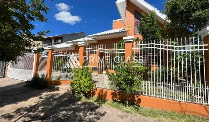 Casa com 5 quartos à venda na Rua Escócia, 29, Marechal Rondon, Canoas por R$ 2.700.000