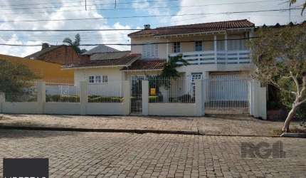 Casa 3 dormitórios à venda Vila Nova Porto Alegre/RS