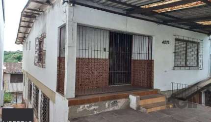 Casa 3 dormitórios à venda Cavalhada Porto Alegre/RS