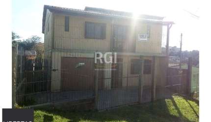 Casa para Venda - 634m², 2 dormitórios, sendo 1 suites, 3 vagas - Lomba do Pinhe