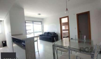 Apartamento mobiliado, 57m2, 1 suite, 1 vaga, lareira e churrasqueira, localizad