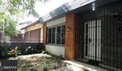 Casa no bairro Jardim Botânico de 3 dormitórios e 2 vagas