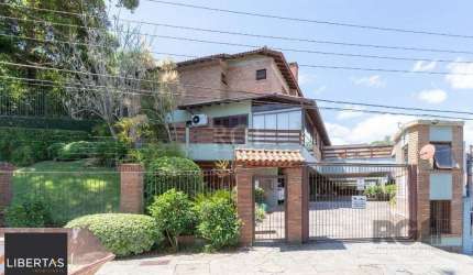 Casa em condomínio fechado para venda no bairro Jardim Isabel, com aproximadamen