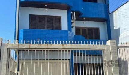 Casa 420m², 4 dormitórios, 3 vagas no bairro Partenon