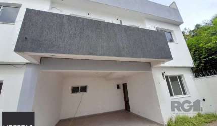 Casa em Condomínio 3 dormitórios à venda Camaquã Porto Alegre/RS