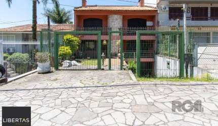 Casa para Venda - 572m², 5 dormitórios, sendo 1 suites, Cavalhada