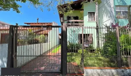 casa com 3 dormitórios, sendo 1 suíte, vaga para 4 carros, no bairro Santana
