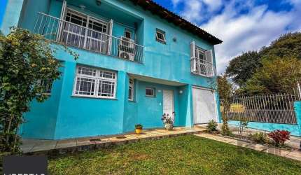 Casa 4 dormitórios à venda Vila Nova Porto Alegre/RS