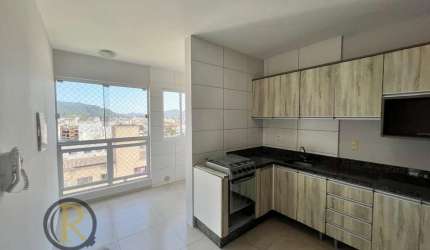 Apartamento com 2 dormitórios localizado a 400 metros do Fórum