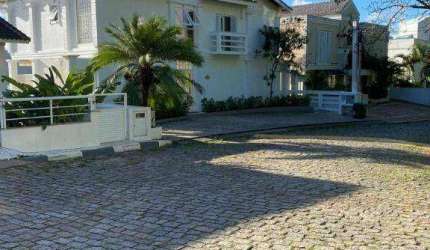 Sobrado com 4 dormitórios à venda, 300 m² por R$ 6.300.000,00 - Península - Guarujá/SP