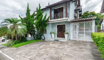 Casa em condomínio fechado com 3 quartos à venda na Avenida Edgar Pires de Castro, 540, Hípica, Porto Alegre por R$ 895.000