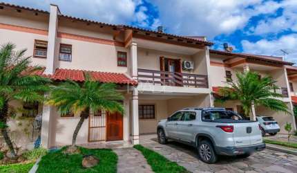 Casa em condomínio fechado com 3 quartos à venda na Avenida da Cavalhada, 4551, Cavalhada, Porto Alegre por R$ 840.000
