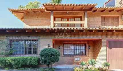 Casa em condomínio fechado com 3 quartos à venda na Rua Carlos Júlio Becker, 295, Tristeza, Porto Alegre por R$ 820.000