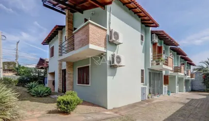 Casa em condomínio fechado com 3 quartos à venda na Rua São Sebastião do Cai, 119, Cristal, Porto Alegre por R$ 379.000
