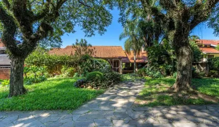 Casa em condomínio fechado com 4 quartos à venda na Avenida da Cavalhada, 5205, Cavalhada, Porto Alegre por R$ 2.300.000
