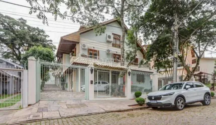 Casa em condomínio fechado com 3 quartos à venda na Rua João Mendes Ouriques, 594, Jardim Isabel, Porto Alegre por R$ 1.150.000