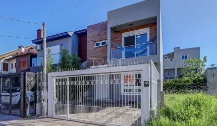 Casa com 3 quartos à venda na Rua Aldo Sani, 143, Hípica, Porto Alegre por R$ 700.000